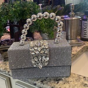 Elegant Silver Beaded Handle Clutch